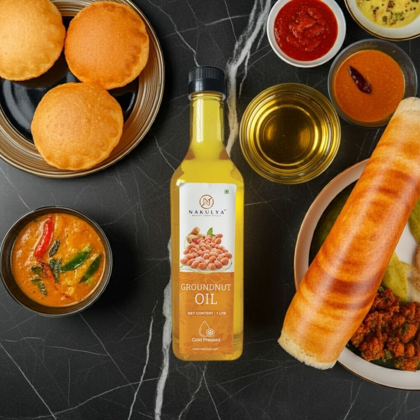 Clear bottle of golden Cold Pressed Groundnut Oil